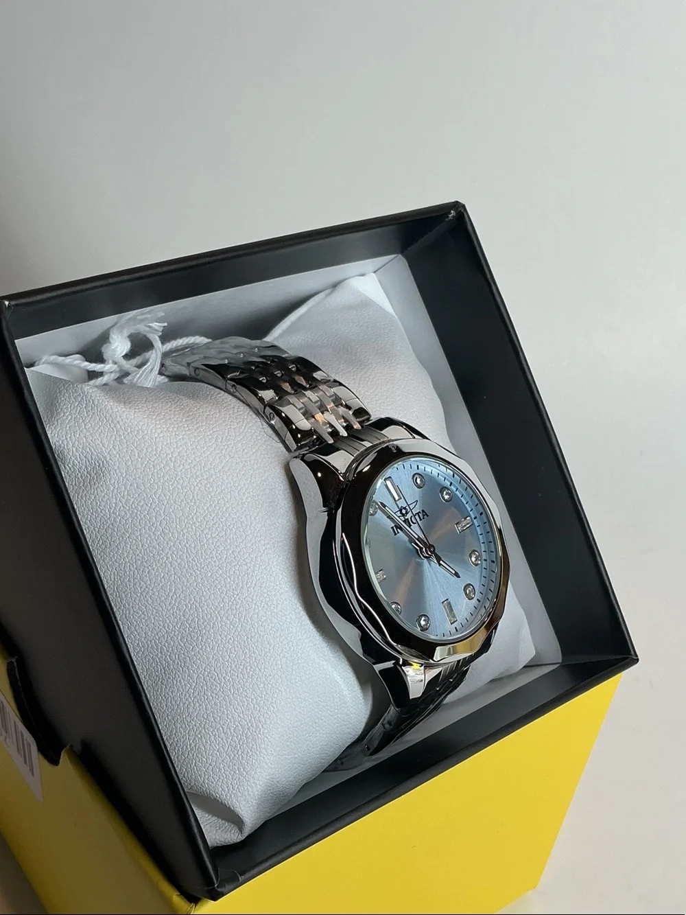 Invicta women’s Silver Watch with Light Blue Dial and Crystal Markers